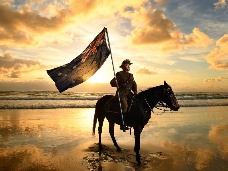 Both major federal parties have suspended election campaigning for Anzac Day.