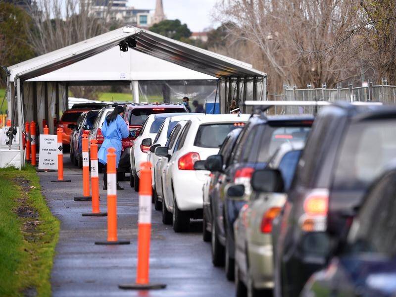 A traffic controller at a drive-through testing centre in Melbourne has tested positive for COVID.