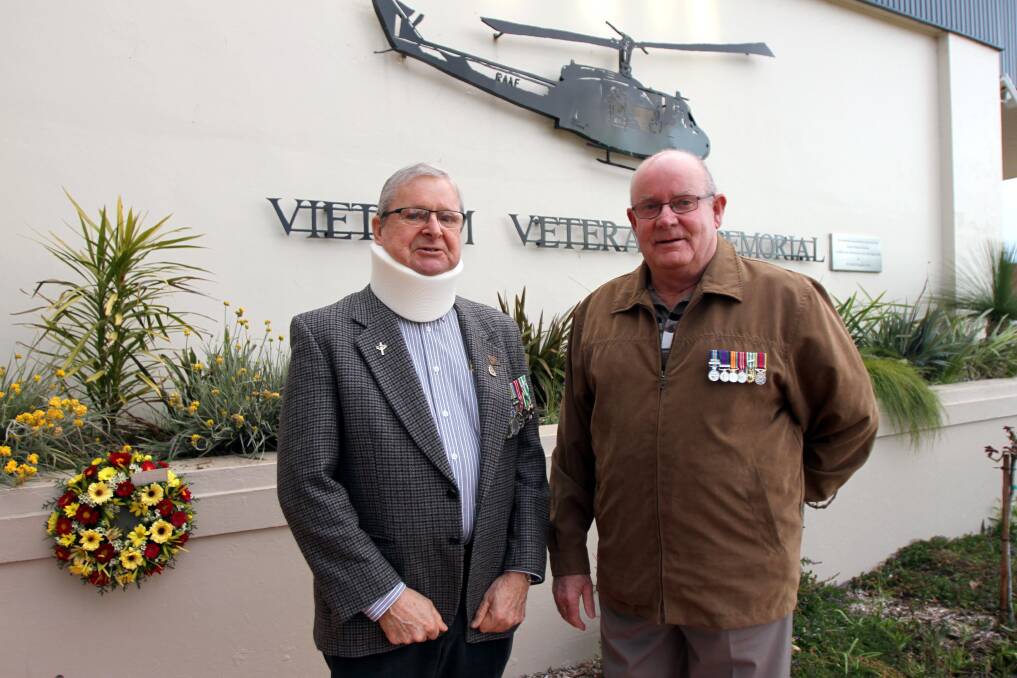 Leeton RSL Sub-branch president John Power and Ian Page commemorate Vietnam Veterans Day.