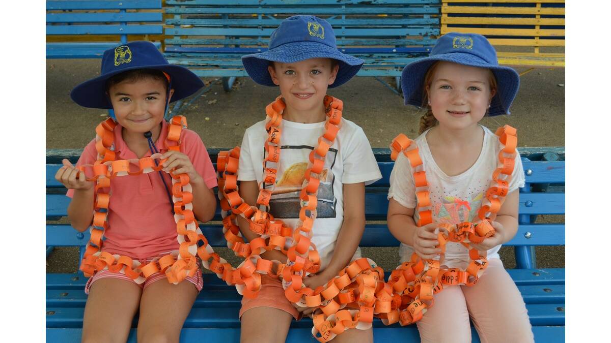 LEETON Public School year 2 student representative council members (from left) Iris Kalon, Luca Deaton and Coco Sands with the Harmony Day chain.
