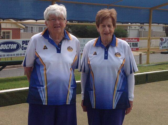 CHAMPS: Leeton and District Ladies Bowling Club Singles runner-up Helen Symes and champion Janet Bell.
