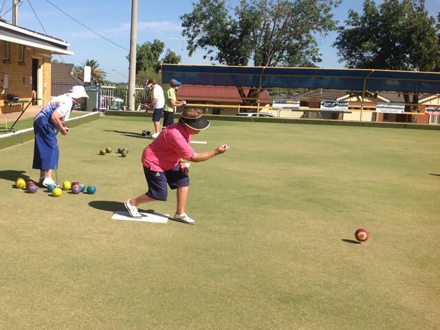LEAD: Leeton and District bowlers Gill Beer and Joan Arnold playing lead at social bowls.