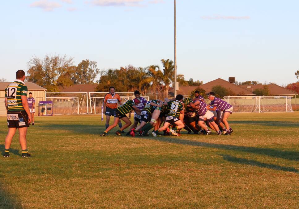 PACKED: The Phantoms pack down in a scrum against Ag College. PHOTO: Emily Wright
