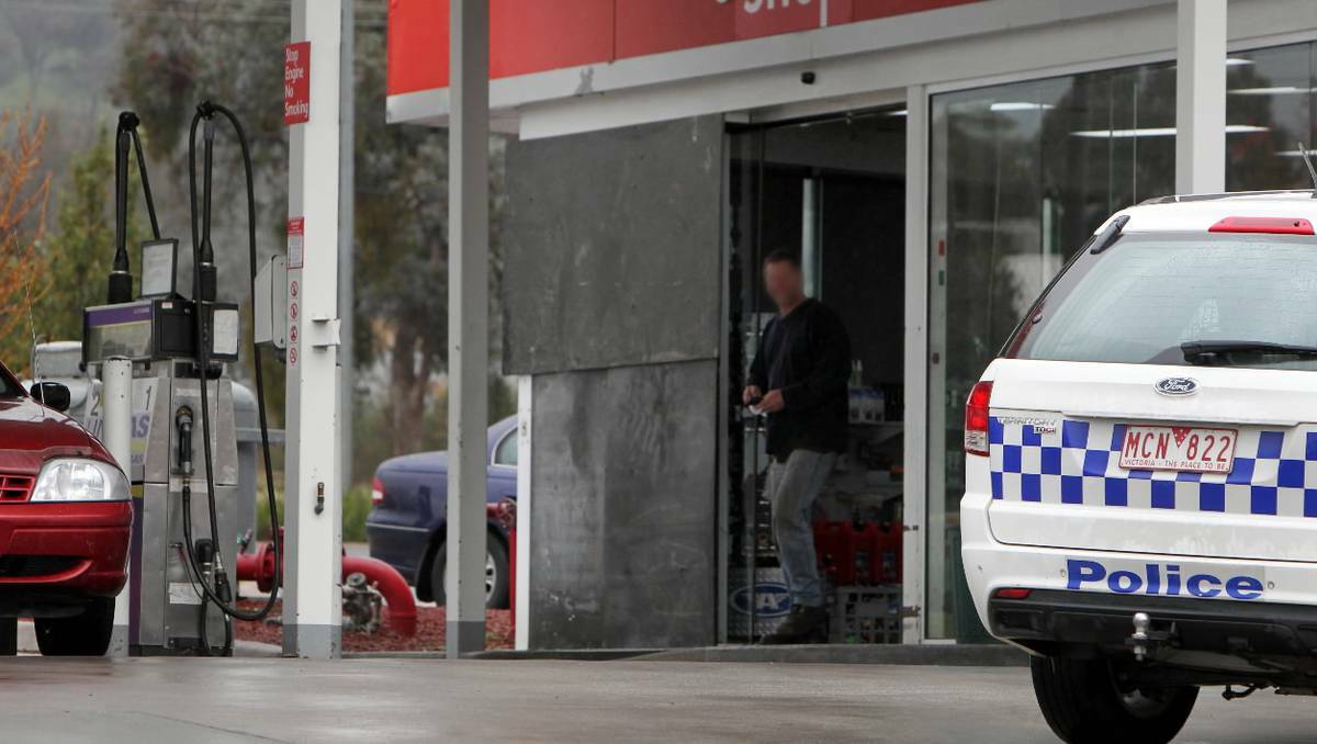 Police searched a Wodonga service station for clues after a ram raid. Picture: The Border Mail.