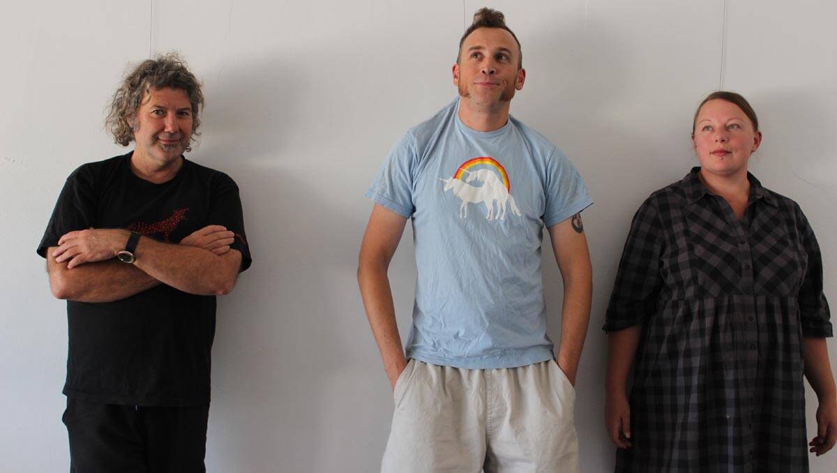 LEETON-BASED artists (from left) Dr Greg Pritchard, Jason Richardson and Jo Roberts are �"hanging� out" for their art misadventure at the Roxy Art Space.