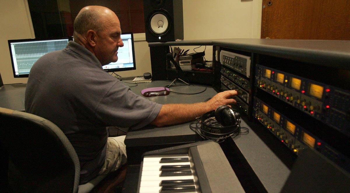 REDBAK Recording Studio manager and producer Mark Hillier at the controls before heading to the Country Music Awards of Australia in Tamworth last week.