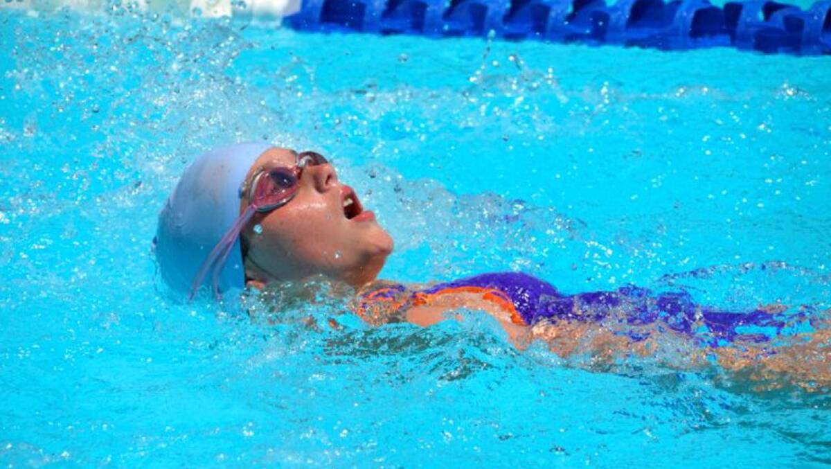 Olivia Winnel in the senior girls 50m backstroke race.