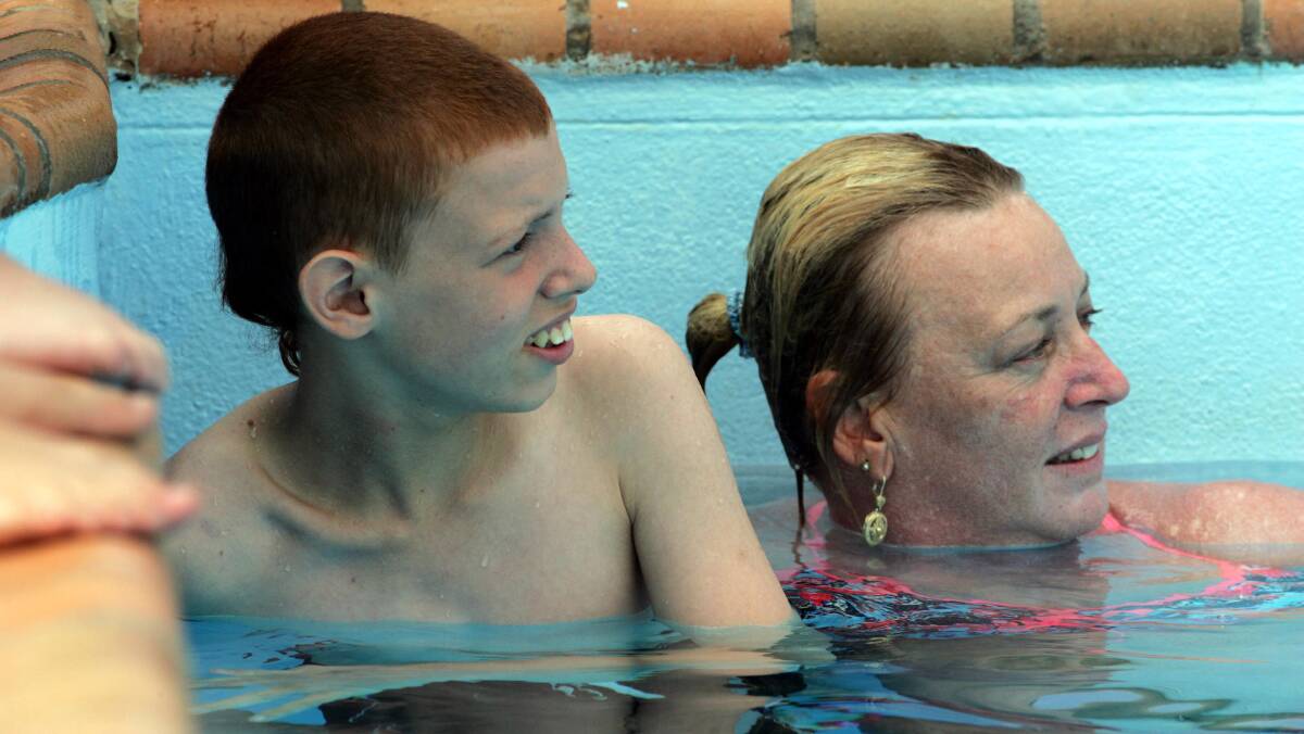 Gralee School student Matthew Greatz with swimming instructor Robyn Simpson.