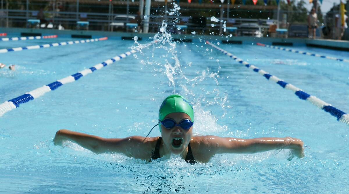 Georgia Saddler in a butterfly event at the Leeton High swimming carnival.