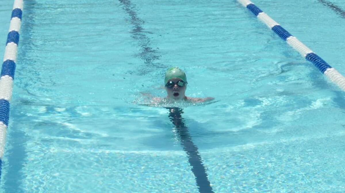 Jye Doyle competing in the 11 years 50m breaststroke 